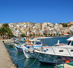 Fototapeta na wymiar Fishing boats at the dock in Sitia, Greece, Crete