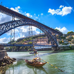 Oporto or Porto skyline, Douro river, boats and bridge. Portugal