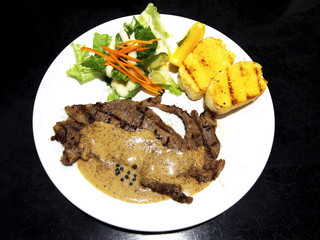 Beef steak and salad in the dish