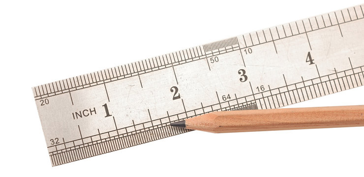 steel ruler and wood pencil on white