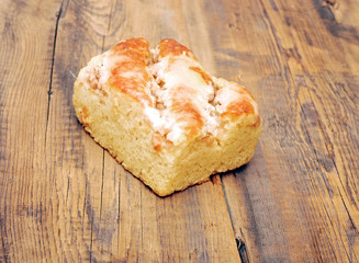 piece of apple pie on wooden table