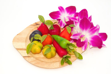 Obraz na płótnie Canvas Deletable imitation fruits ,Thai Dessert with orchid