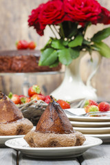 Pear in cake with chocolate sauce
