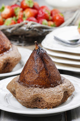Pear in cake with chocolate sauce
