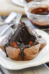 Pear in cake with chocolate sauce