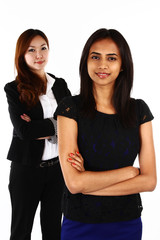 Two happy Asian business women standing together