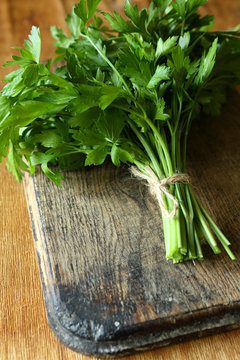 fresh and juicy parsley on the board