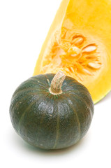 Green pumpkin close-up on white background