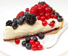 Piece of a pie with fresh berries