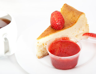 Biscuit with a strawberry and strawberry jam