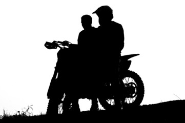 motocross biker silhouette during the sunset