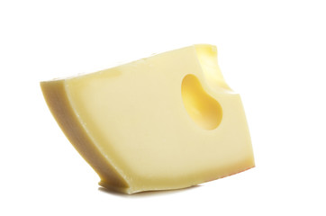 Emmenthal cheese close up on the white