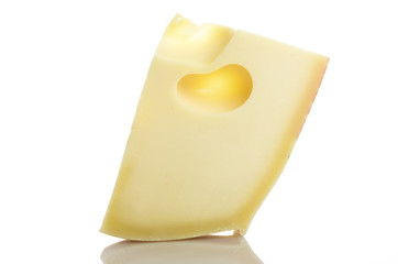 Emmenthal cheese close up on the white
