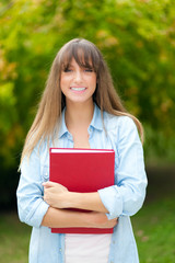Fototapeta premium Smiling student in the park