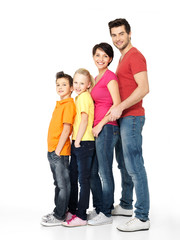 Fototapeta premium Happy family with children standing together in line