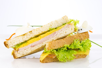 sandwich with ham and cheese, decorated eggs