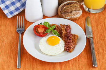 Fried egg and bacon for breakfast