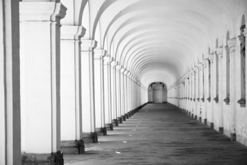 Long baroque arcade colonnade in black and white tone