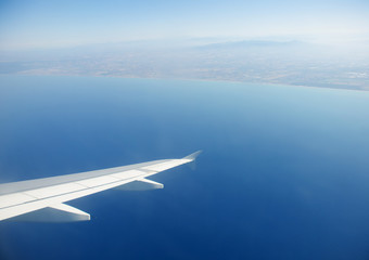 Fototapeta premium Airplane wing out of window