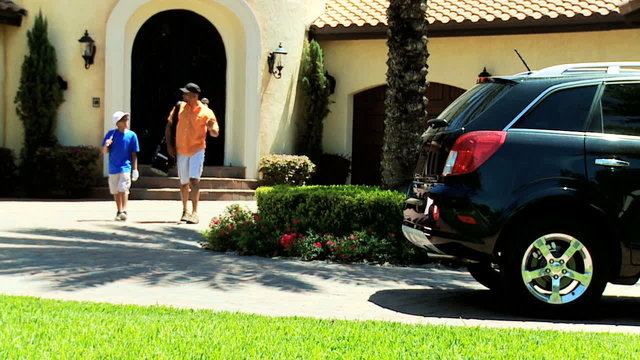 Ethnic Father Young Son Preparing Play Golf
