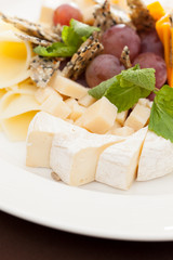 Cheese plate with grapes