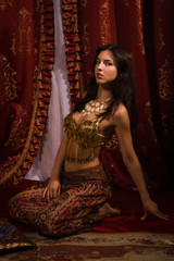 Fototapeta premium Oriental woman in a traditional costume
