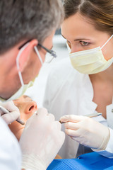 Obraz na płótnie Canvas Patient with Dentist - dental treatment