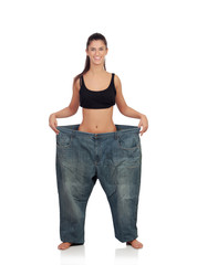 Slim woman with huge pants