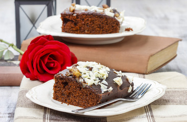 Fototapeta na wymiar Gingerbread cake with chocolate and hazelnuts. Selective focus