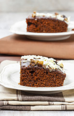 Gingerbread cake with chocolate and hazelnuts. Selective focus