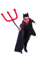 Man in devil costume in halloween concept