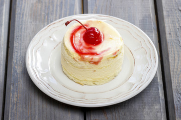Round birthday cake before decoration.