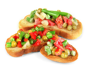 Sandwiches with vegetables and greens isolated on white