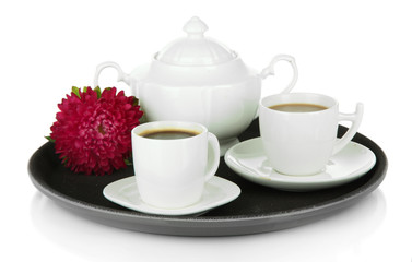 Cups of coffee on tray isolated on white
