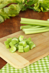Fresh green celery on table close-up