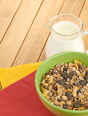 Delicious and healthy cereal in bowl with milk