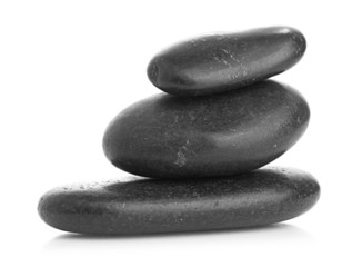 Growing piled up pebbles on a white background