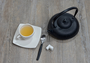 tasse de the avec une theière