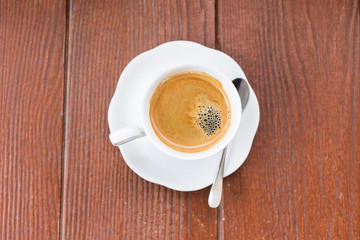 Coffee on grunge wooden background