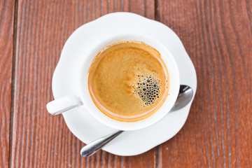 Coffee on grunge wooden background