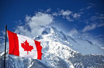 Canadian flag and beautiful mountain landscape