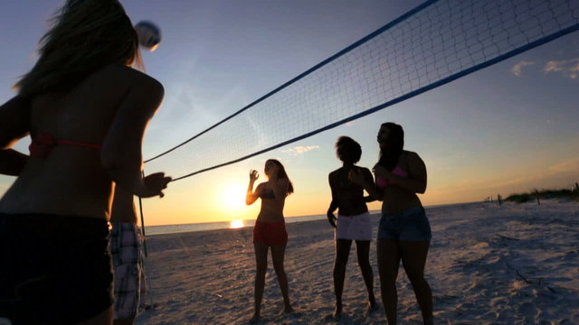 Group Teenage Vacation Friends Playing Volleyball Beach