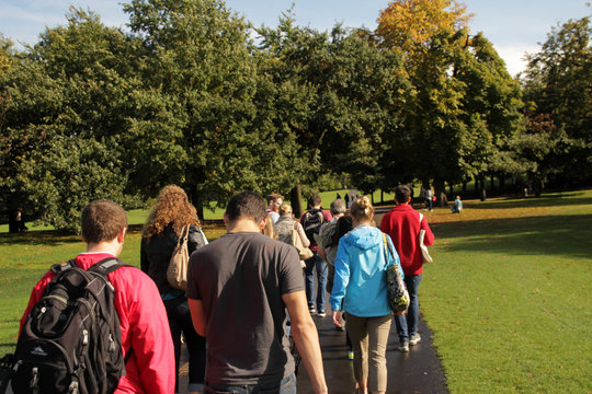Fototapeta Group of young people walking in Greenwich Park, London