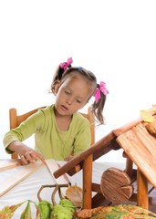 small girls in do handicraft