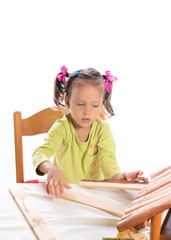 small girls in do handicraft
