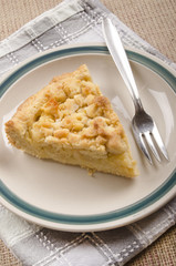 freshly baked crumb cake on a plate