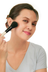 Obraz premium Middle age asian woman with make up brush.