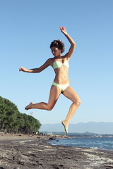 Girl Jump on Beach