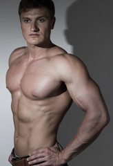 Portrait of young handsome bodybuilder