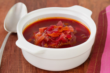 beet soup in white bowl